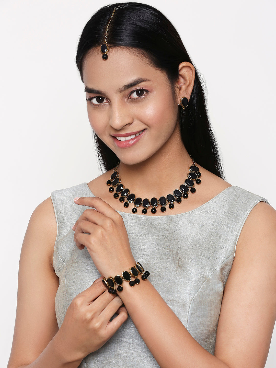 Ethnic Gold Plated Oval Shape Black Kundan Necklace set with Maang Tika and Bracelet