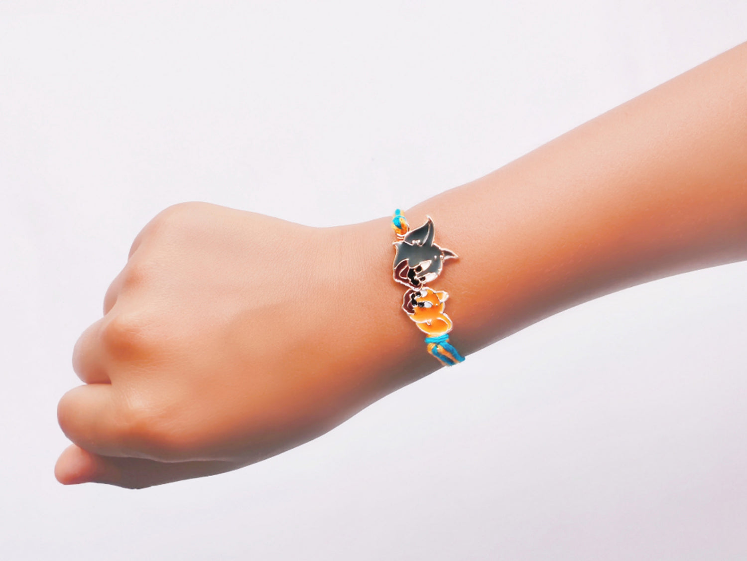 Rose Gold Plated Cartoon Rakhi for Kids with Meena Work