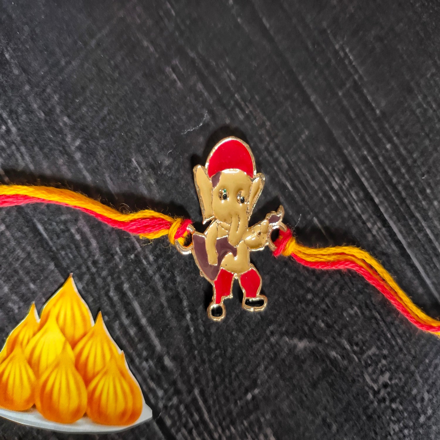 Meena Work Bal Ganesha Kids Rakhi