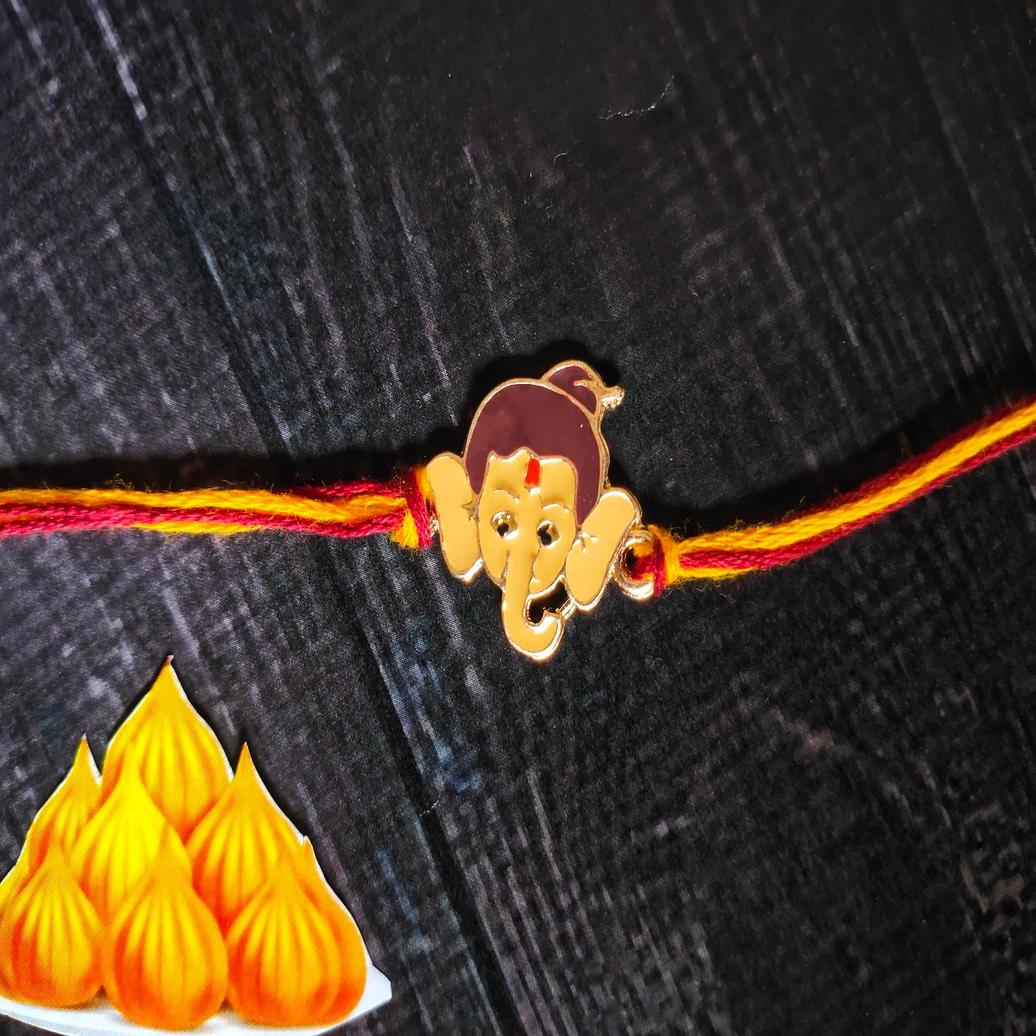 Meena Work Bal Ganesha Kids Rakhi