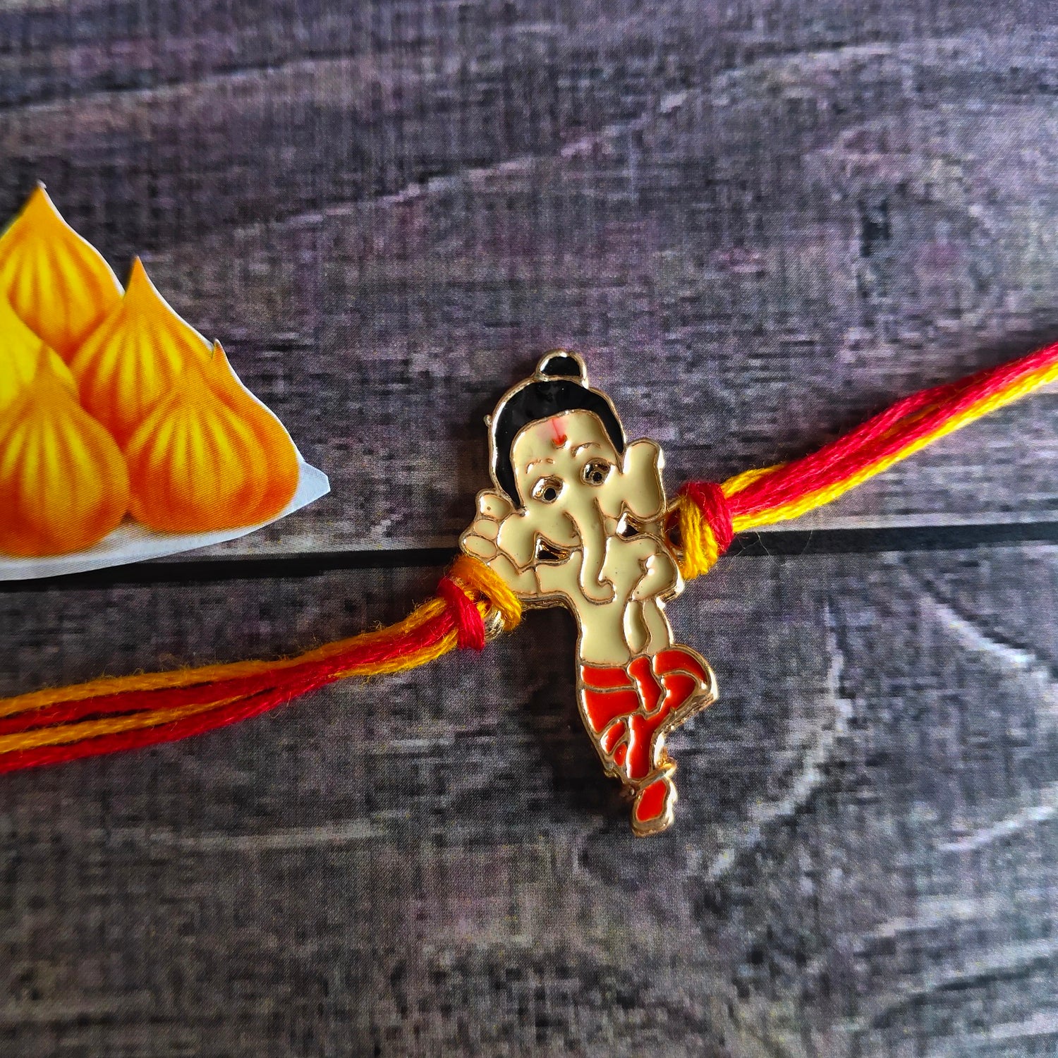 Meena Work Bal Ganesha Kids Rakhi