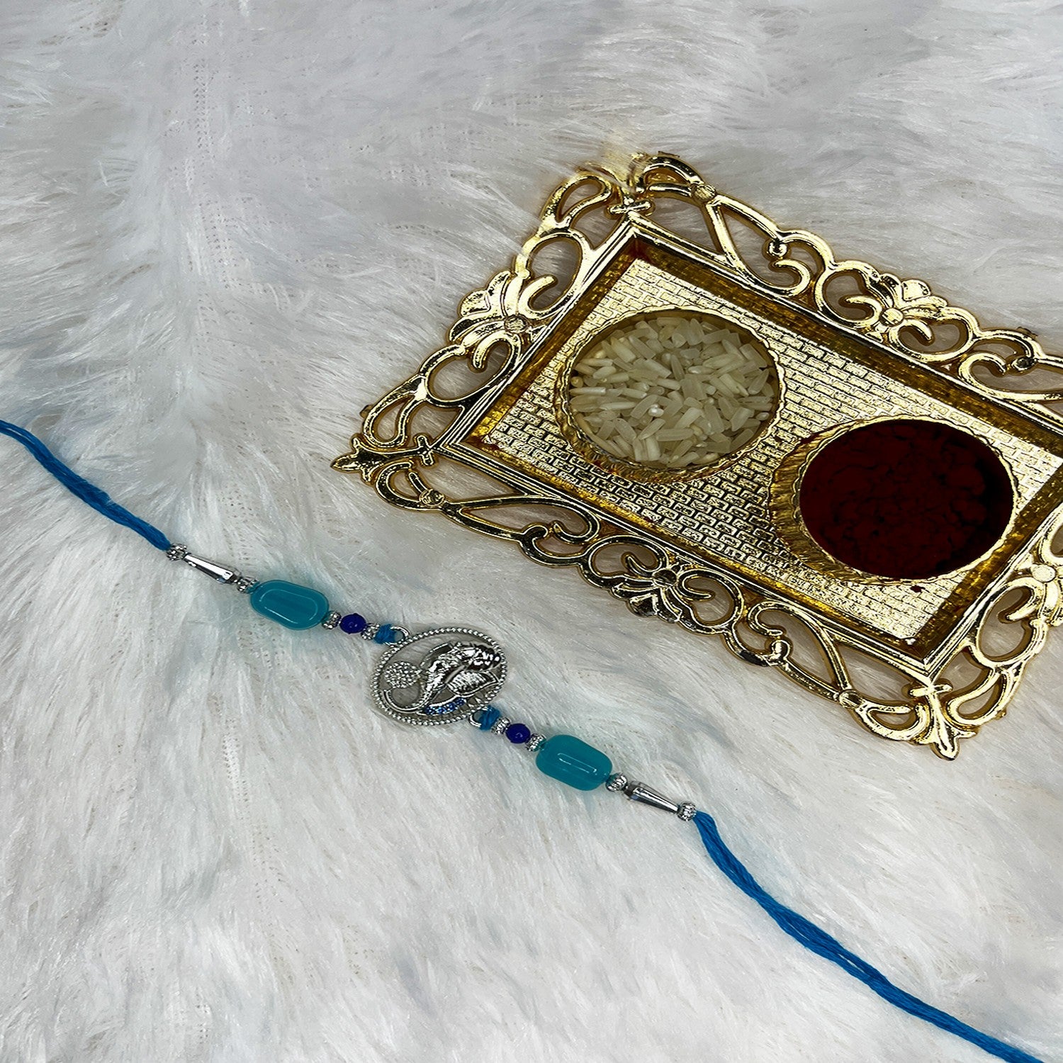 Vighnaharta Ganpati Studded Rakhi