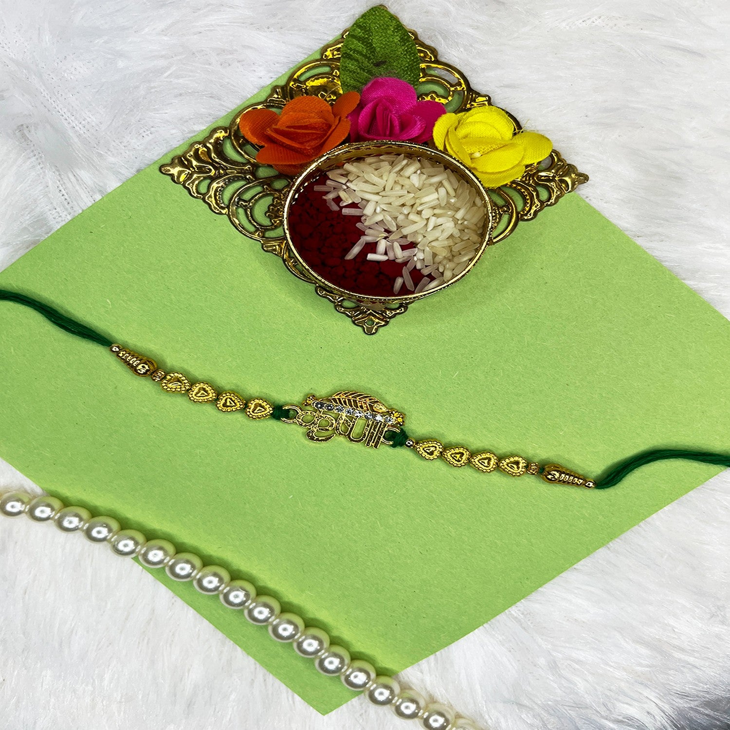 Krushna and and Peacock-Feaher-Shaped Rakhi