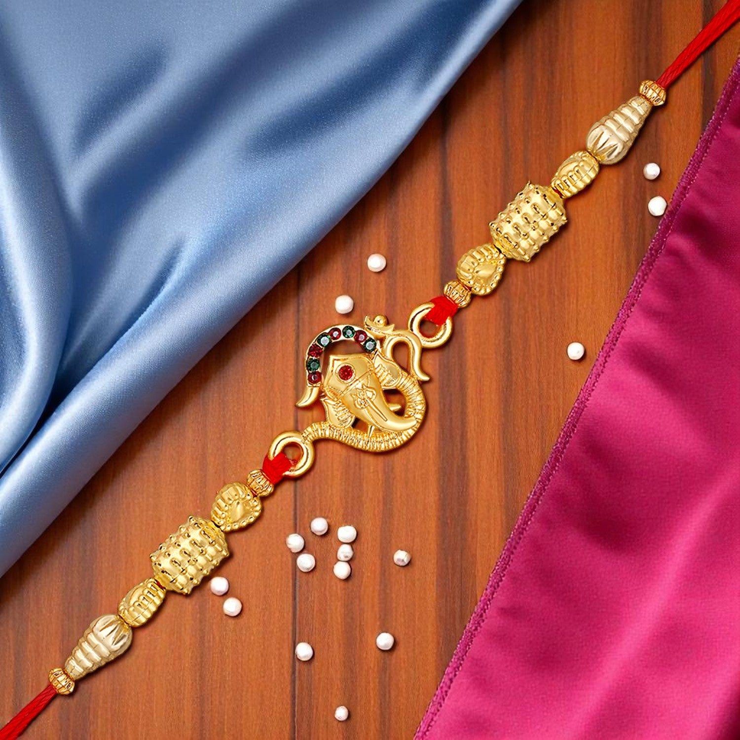 Vighnaharta Ganpati Studded Rakhi