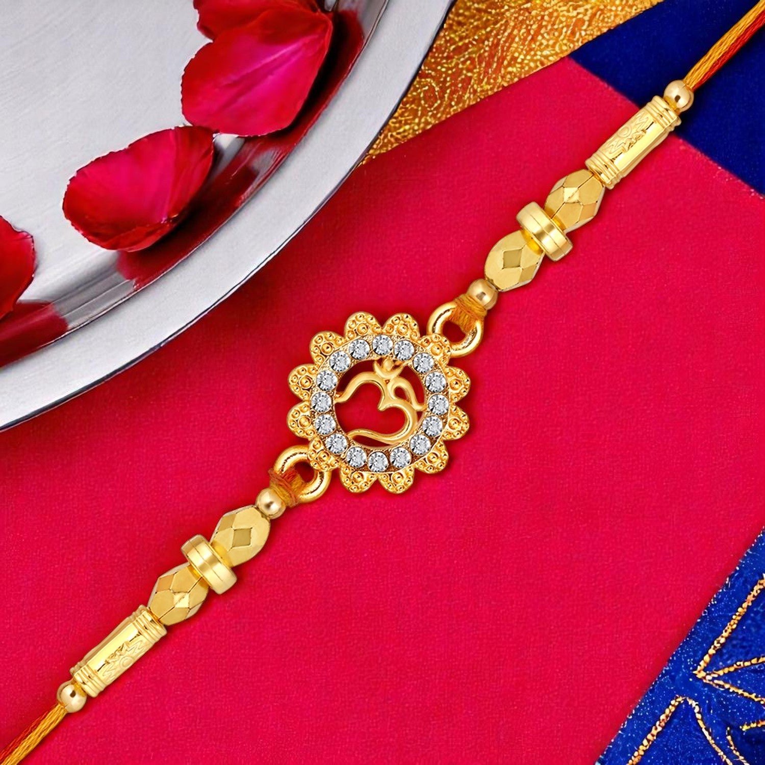Floral and OM Engraved Studed Rakhi