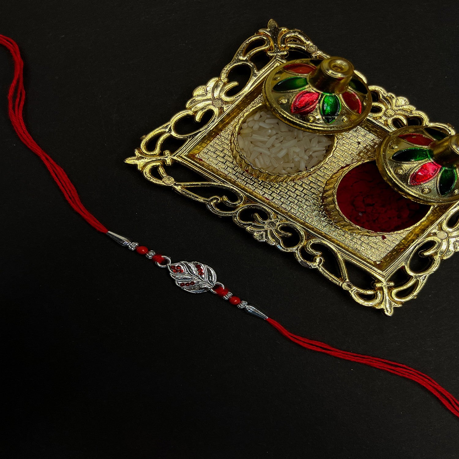 Feather-Shaped Studded Rakhi