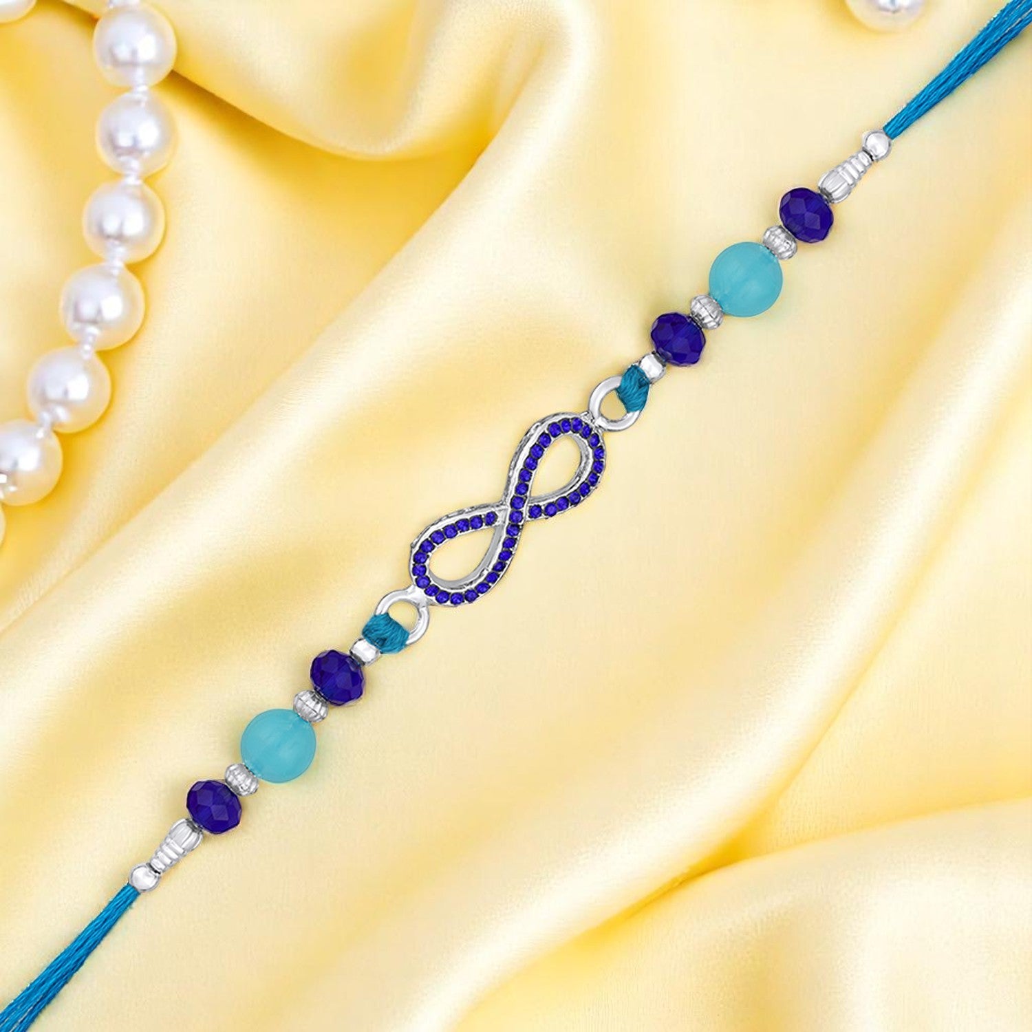 Infinity Shape Blue Crystal Studed Bhaiya Rakhi