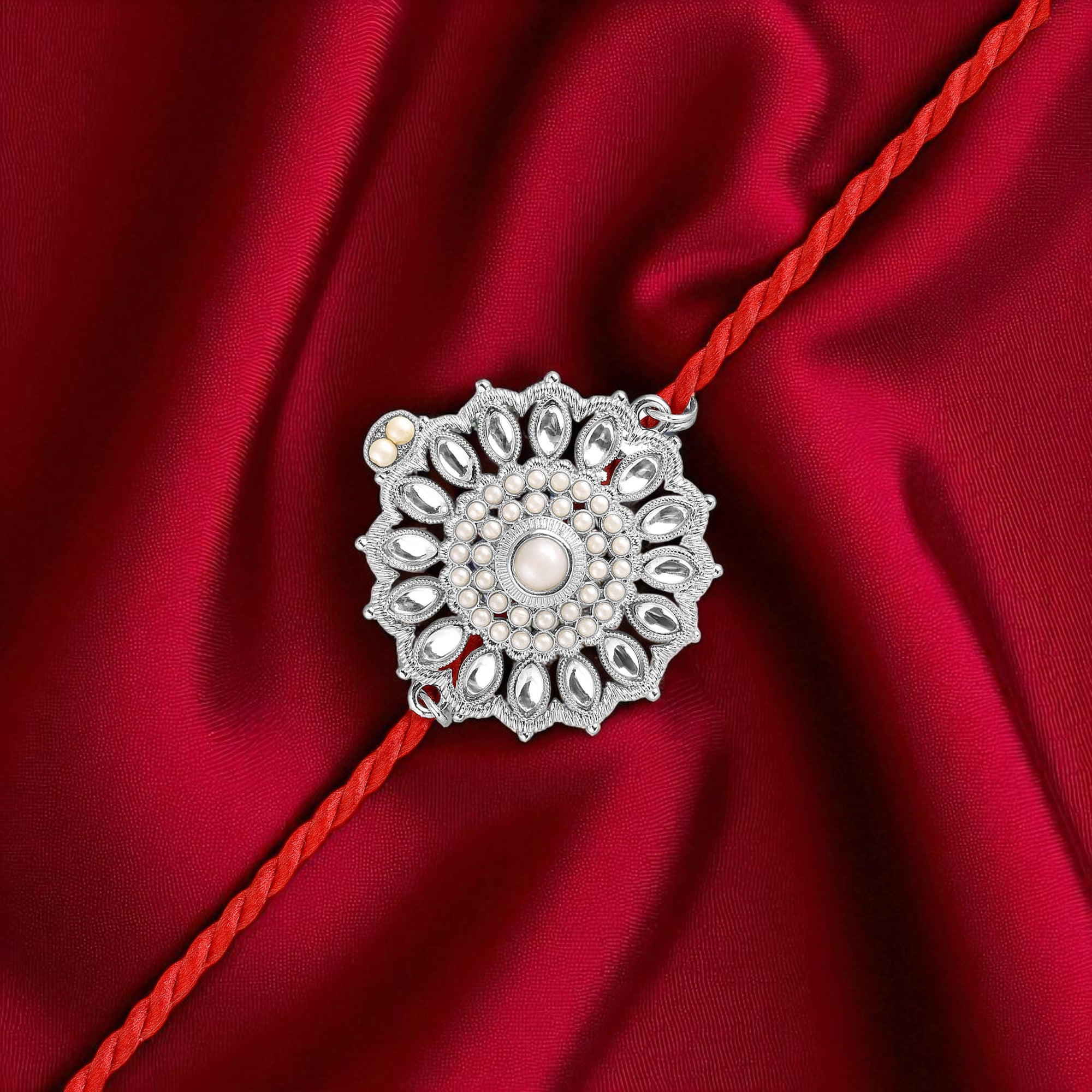 Silver-Toned Motif Floral Rakhi