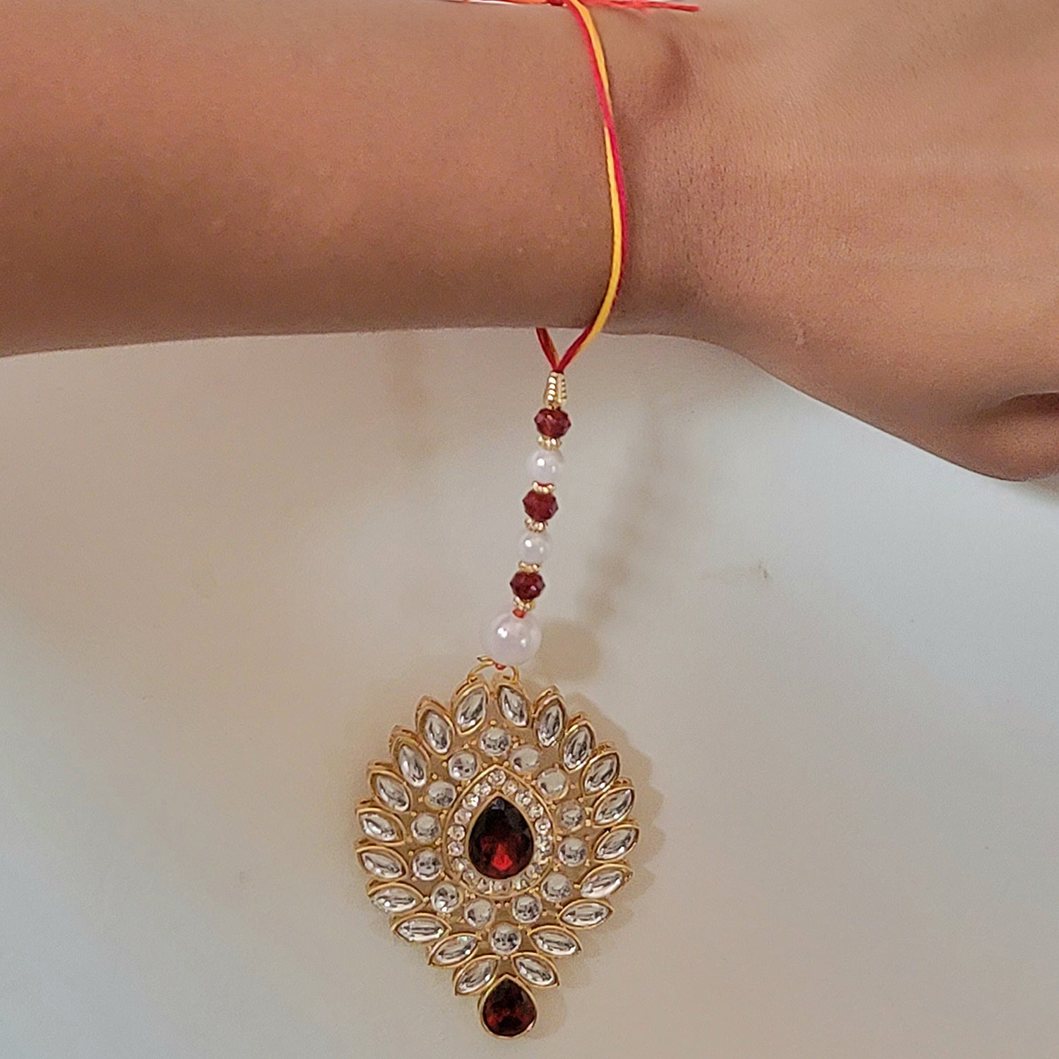 Leaf Shape Red and White Lumba Rakhi