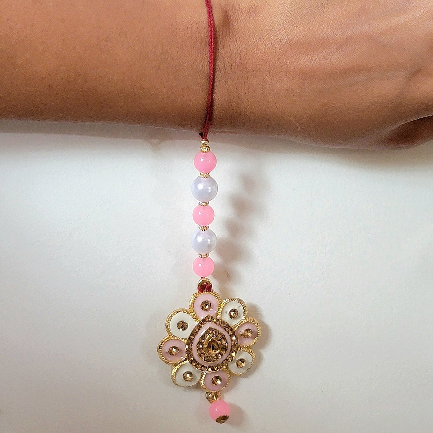 Floral Shaped Pink Meenakari Work Lumba Rakhi