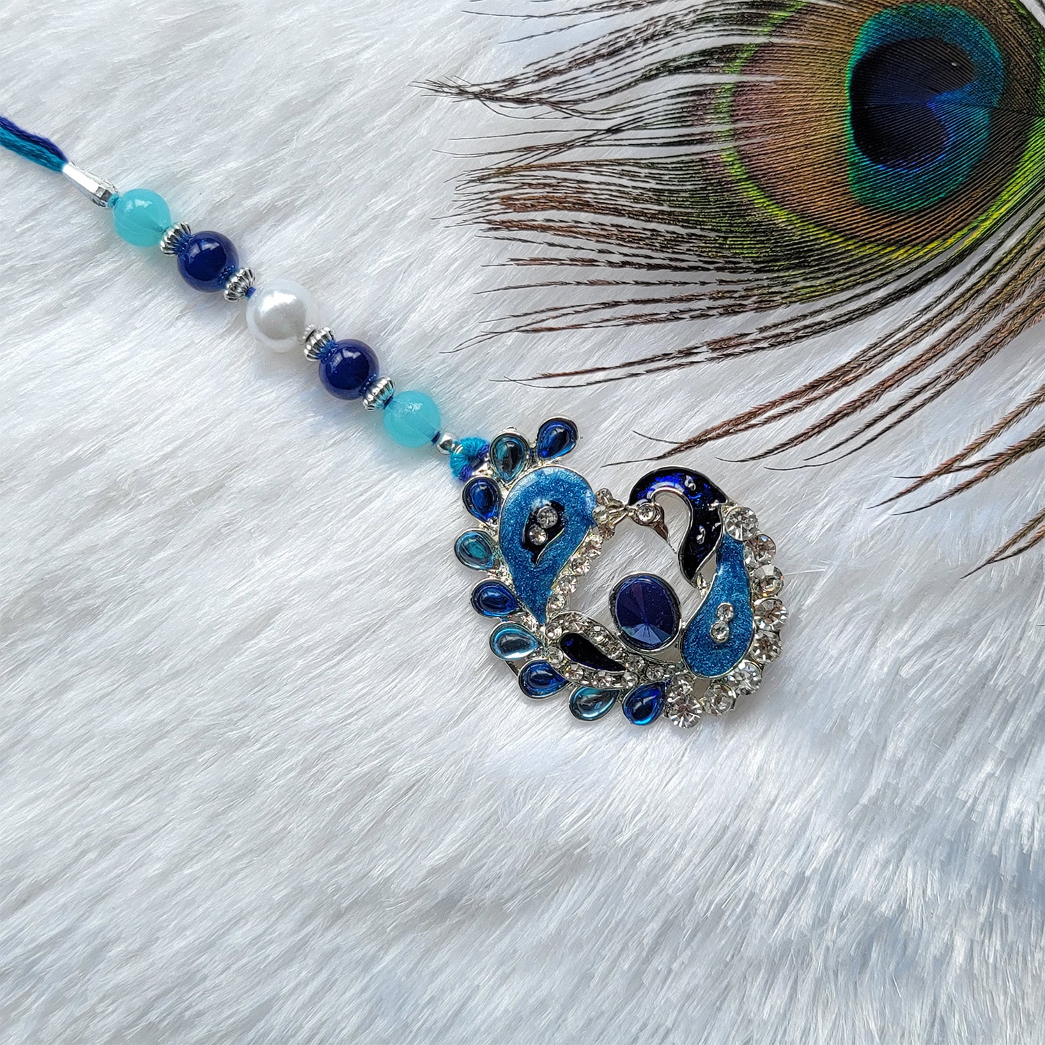 Blue Meenakari Work Peacock Shaped Lumba Rakhi