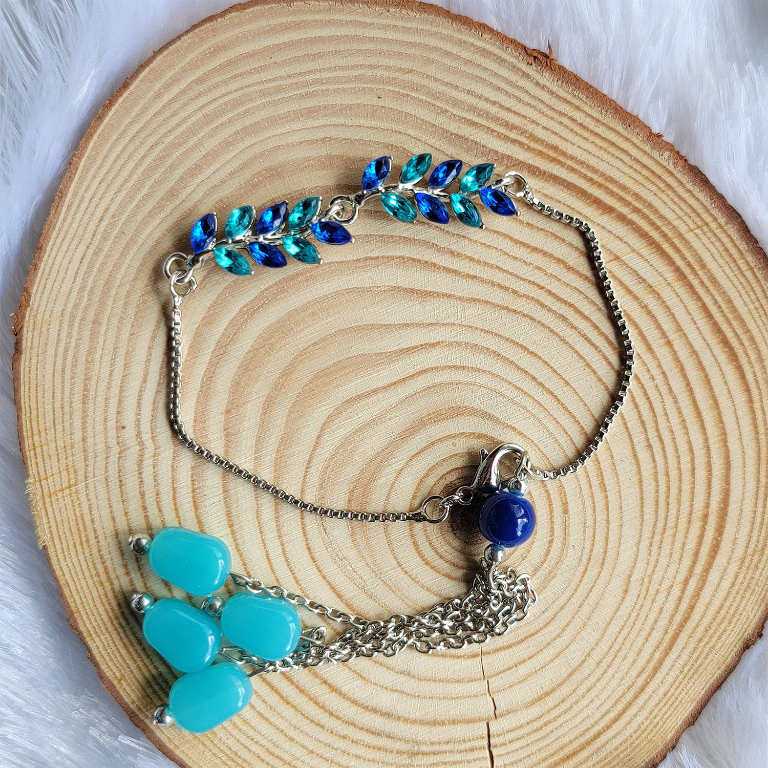 Leaf Shaped Lumba Rakhi Bracelet for Bhabhi with Crystals