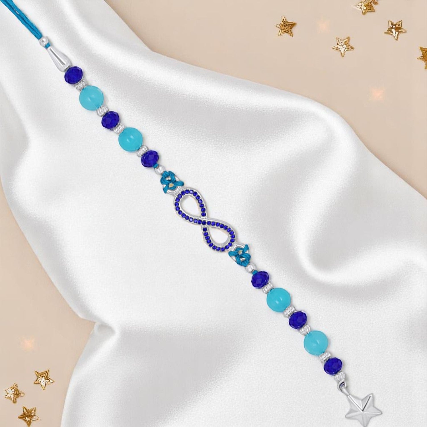 Infinity Shape Blue Crystal Studed Lumba Rakhi