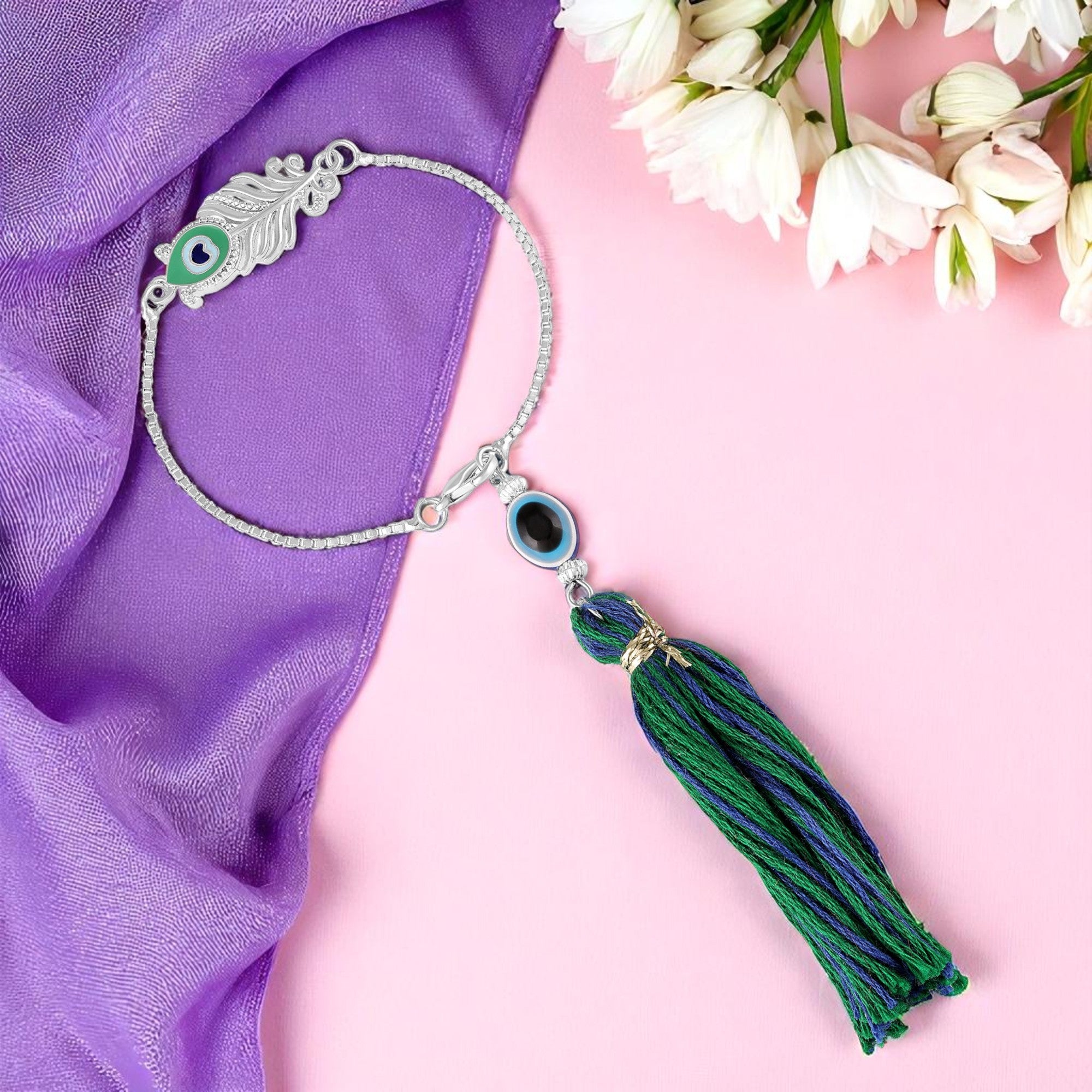 Peacock-Feather-Themed Lumba Rakhi with Tassel