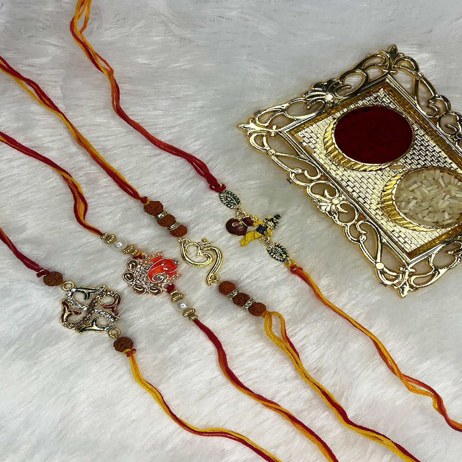Combo of Om Ganesha Krishana and Swastik Rakhis