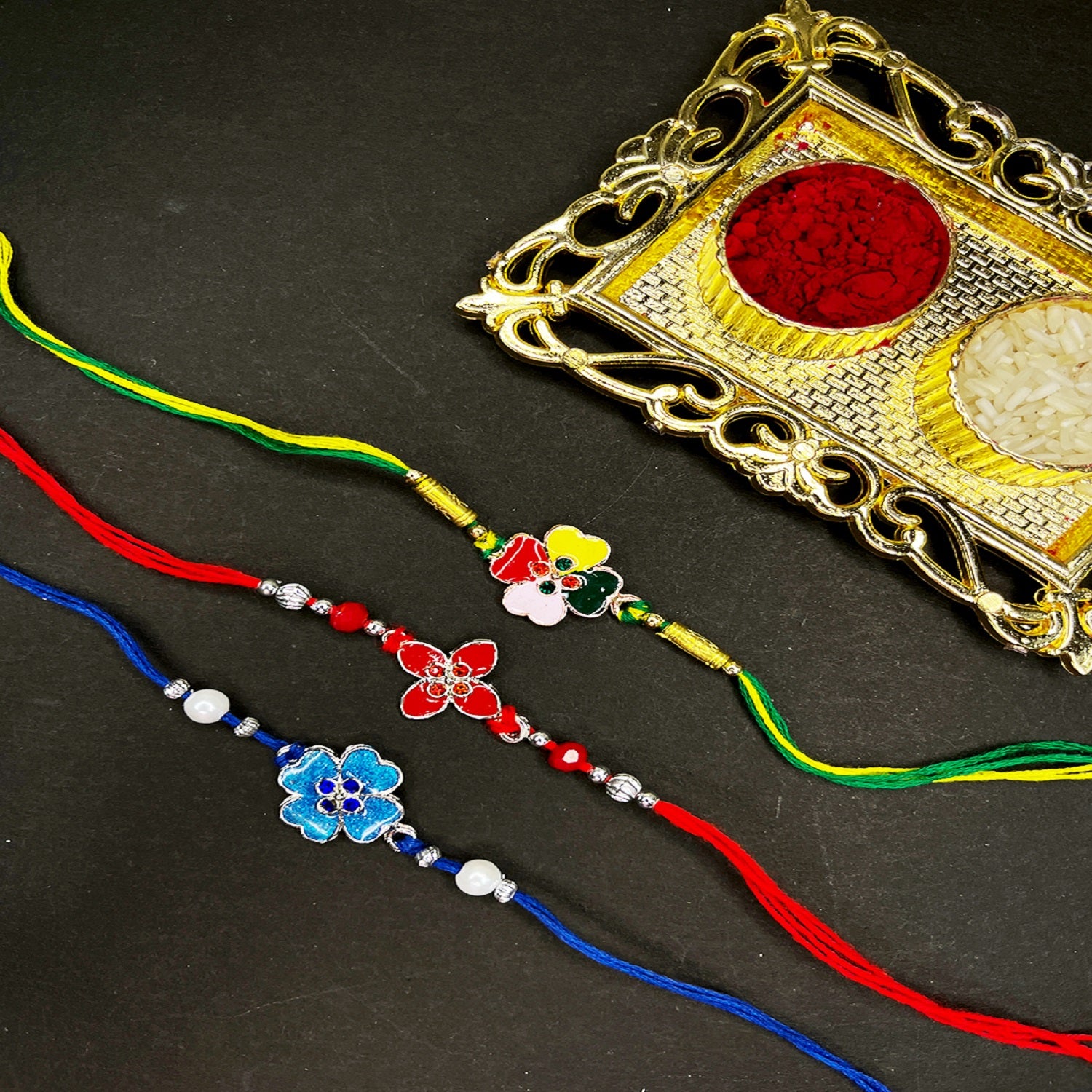 Combo of 3 Meenakari Worn\k and Studded Crystals Floral Rakhi