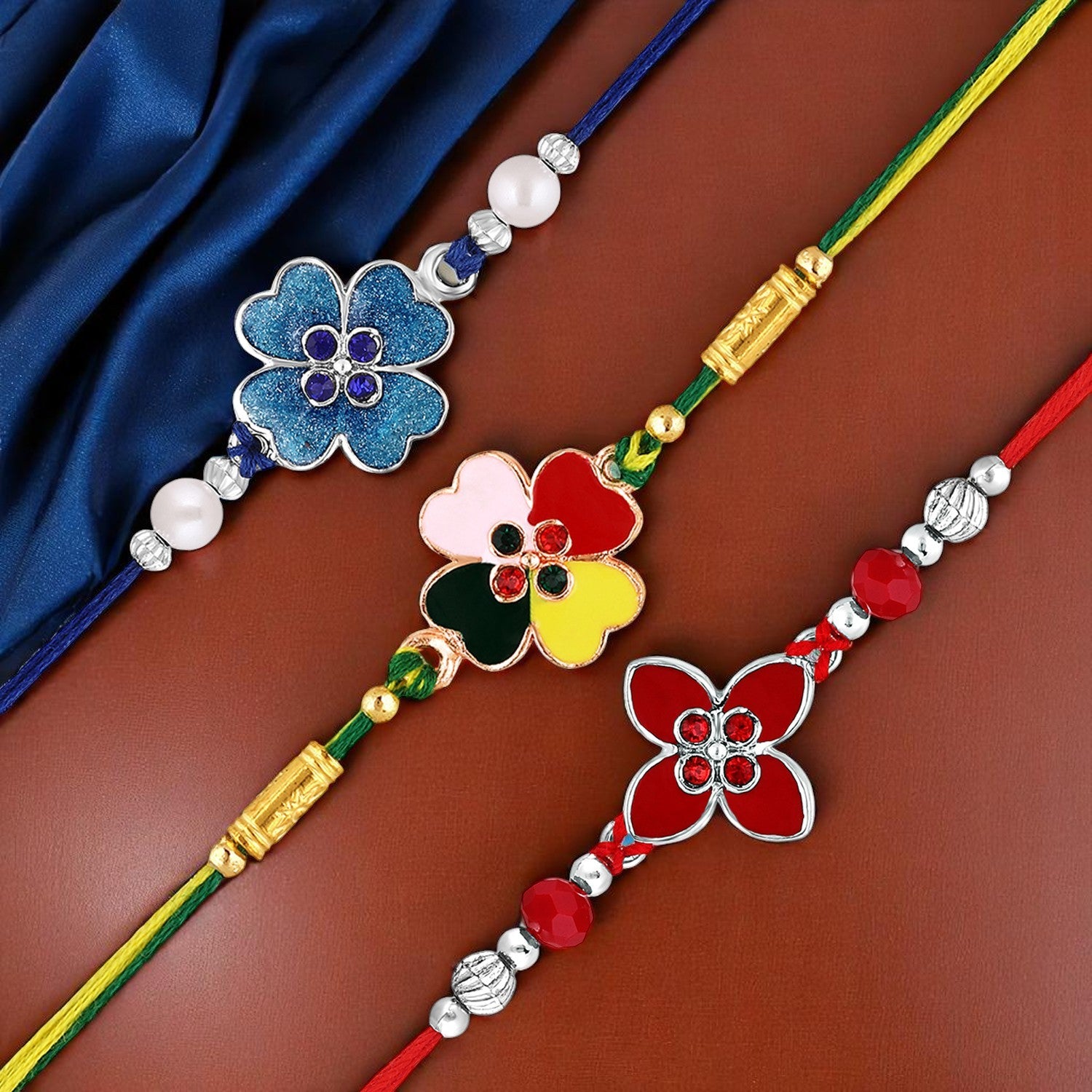 Combo of 3 Meenakari Worn\k and Studded Crystals Floral Rakhi