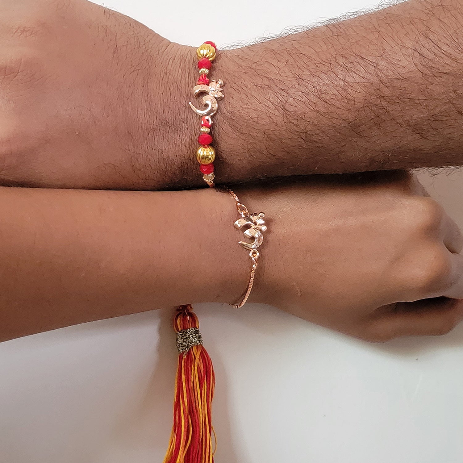 Om Couple Rakhi with Tassle