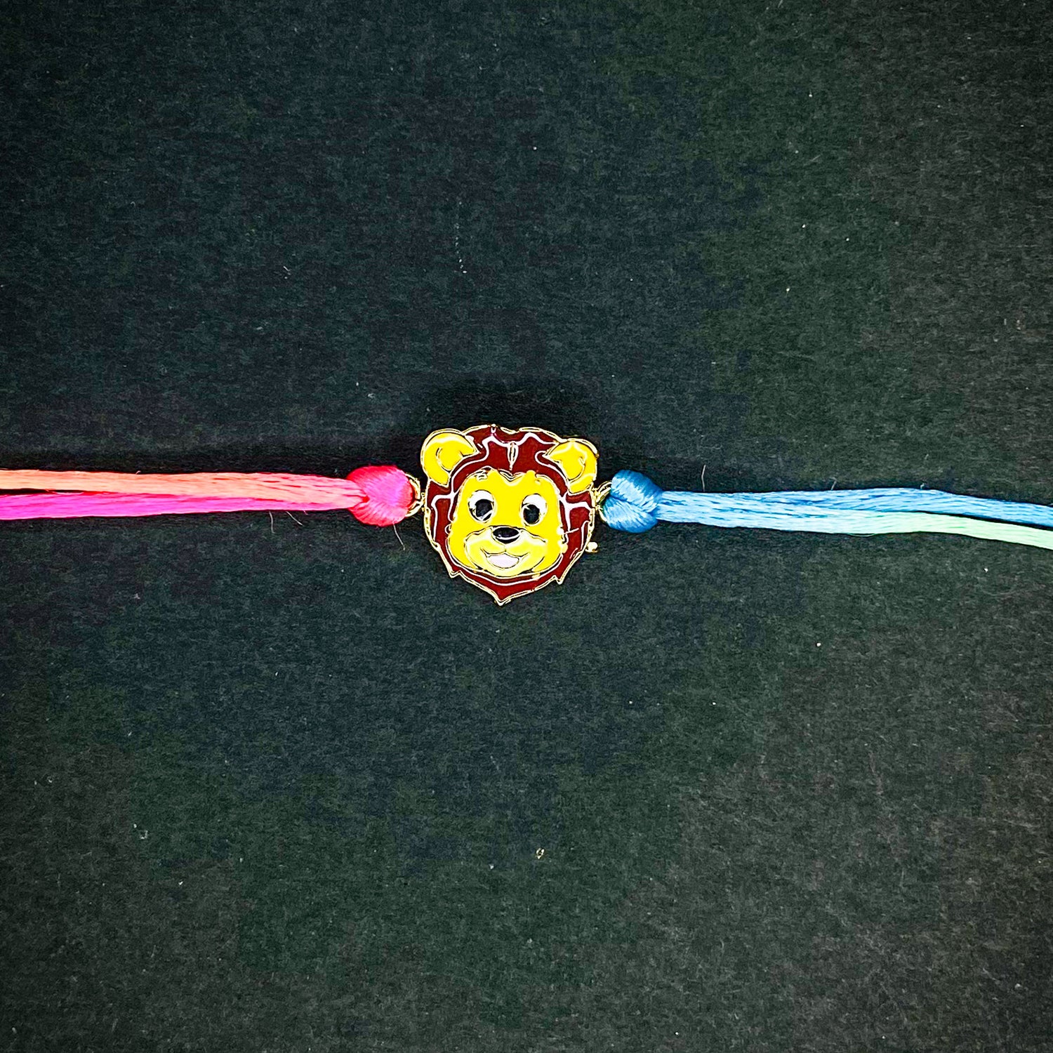 Meena Work Enameled Lion-Shaped Carton Rakhi