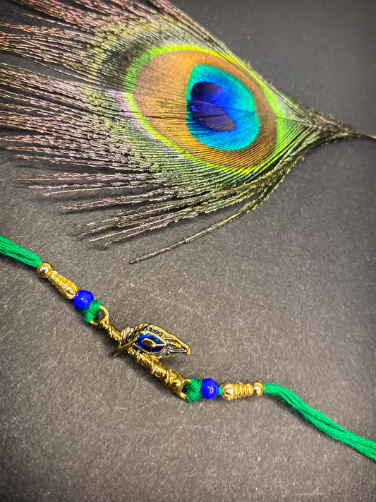Krishna Flute, Meena Work Peacock Feather-Shaped Rakhi