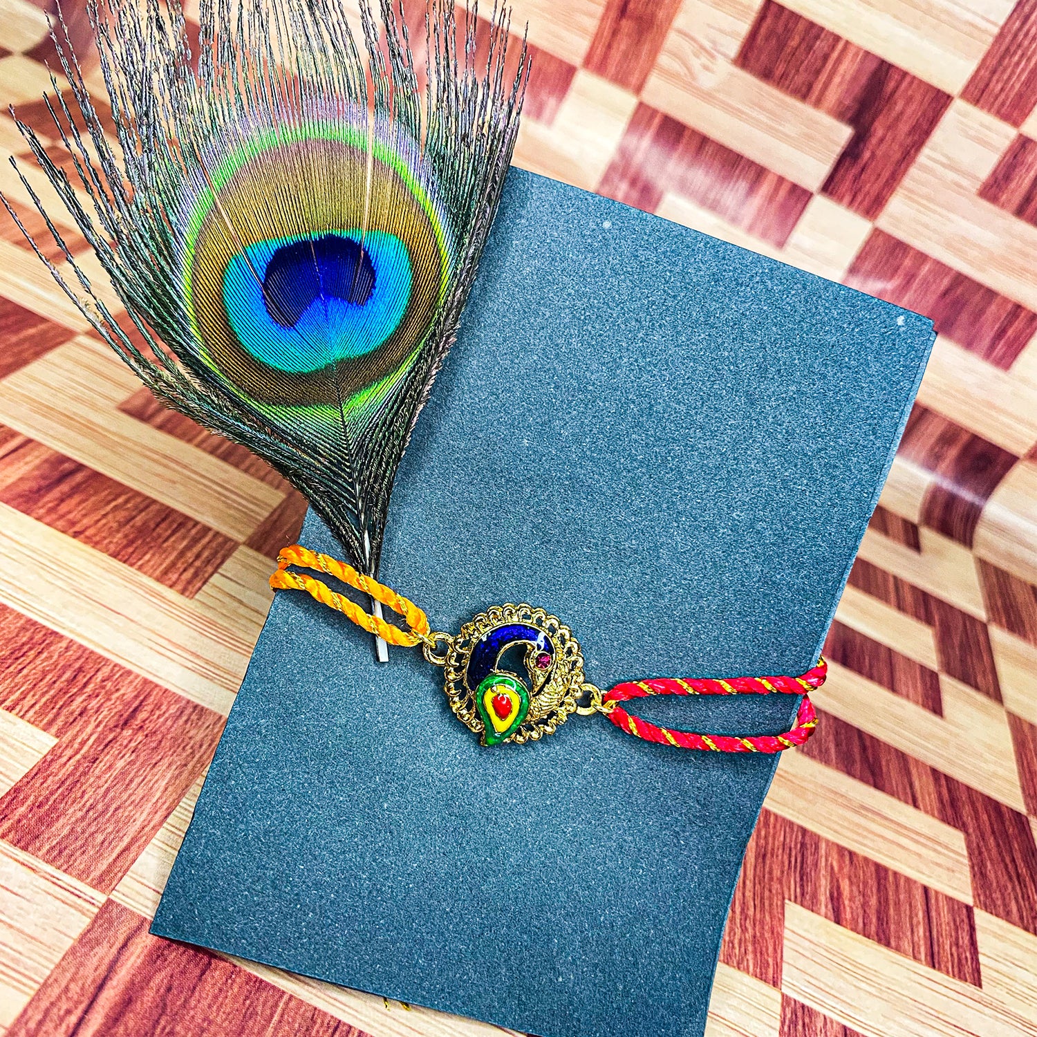 Meenakari Enamel Peacock-Shaped Fancy Rakhi