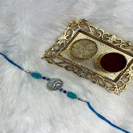 Vighnaharta Ganpati Studded Rakhi
